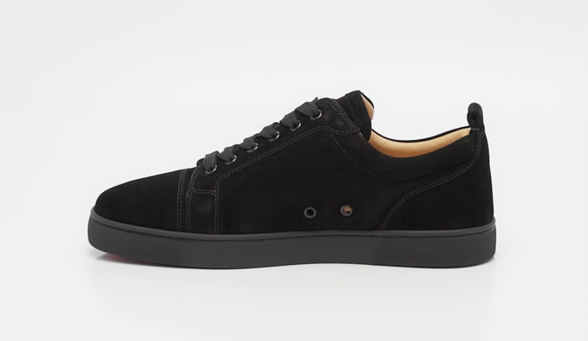 Black sneakers from the E'SHOE ATELIER photographic collection